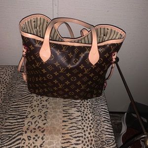 Cute purse looks like a Louis Vuitton